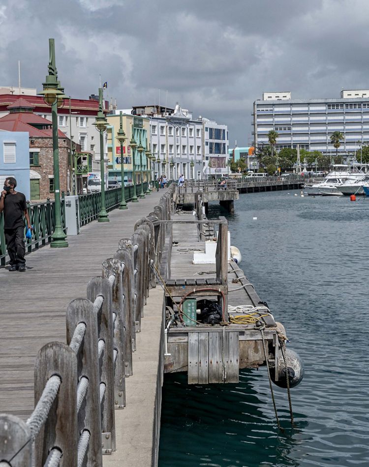 Photo of a boardwalk along a Barbados bay.