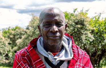 A close up portrait of a Maasai man.