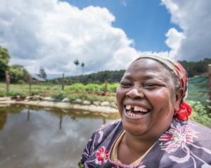 Elena Kinyua, an innovative farmer in the foothills of Mt. Kenya, receives support from the Upper Tana-Nairobi Water Fund. 