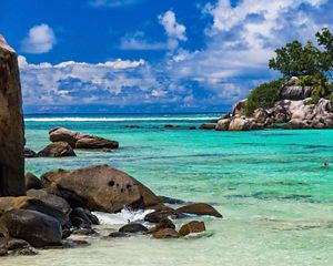 snorkelers in crystal blue waters
